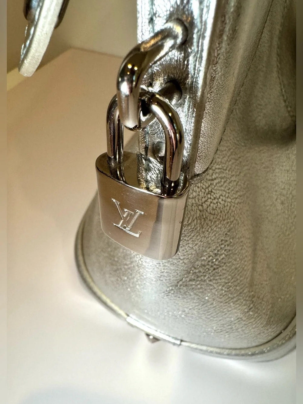 Louis Vuitton Suhali Lockit PM In Metallic Silver Leather